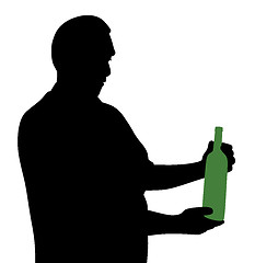 Image showing Man looking at bottle of alcohol