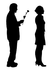 Image showing Man saying sorry and giving a rose to offended woman