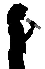 Image showing Kid girl singing a song with microphone