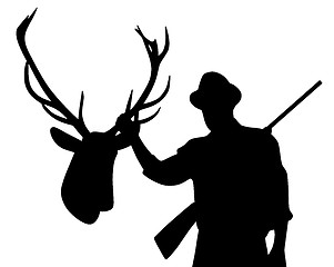 Image showing Hunter with rifle holding stuffed deer head hunting trophy