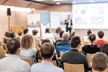 Image showing Business speaker giving a talk at business conference event.