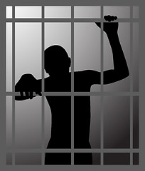 Image showing Man in dark dungeon or prison behind bars