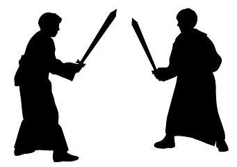 Image showing Two kids sword fighting duel in medieval style costumes
