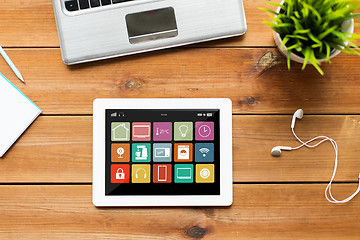 Image showing close up of tablet pc computer on wooden table