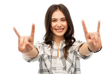 Image showing young woman or teenage girl showing rock sign