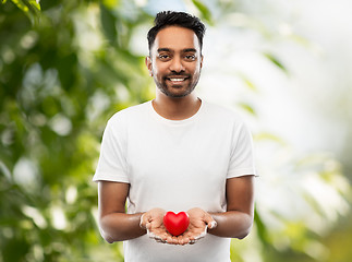 Image showing smiling indian man with red heart