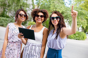 Image showing women with tablet computer on street in summer