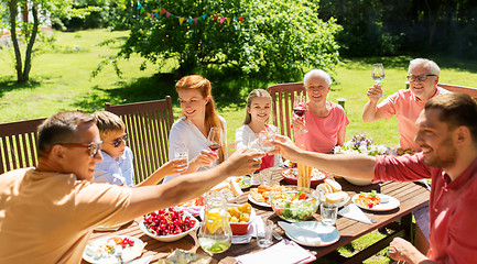 Image showing family gathering at summer garden and celebration