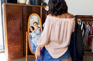 Image showing women choosing clothes at vintage clothing store