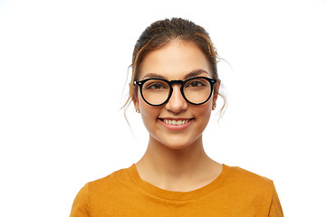 Image showing smiling student girl in glasses over white