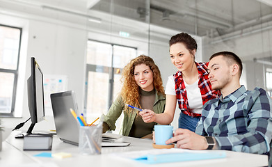 Image showing creative team with laptop working at office