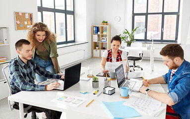 Image showing creative team working on user interface at office