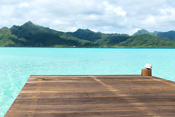 Image showing wooden pier on tropical beach in french polynesia