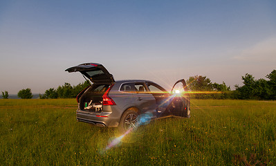 Image showing drone ready for fly in suv trunk l