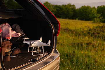 Image showing drone ready for fly in suv trunk l