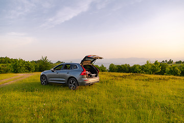 Image showing drone ready for fly in suv trunk l