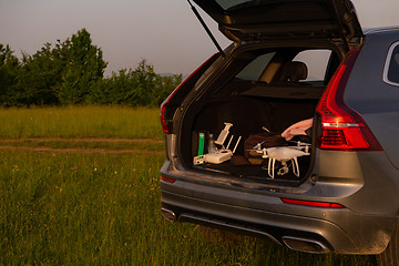 Image showing drone ready for fly in suv trunk l