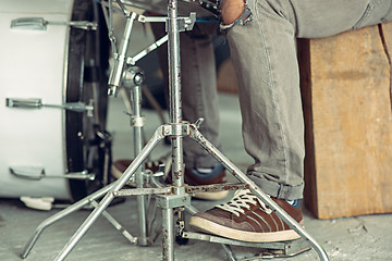 Image showing Repetition of rock music band. drummer behind the drum set.