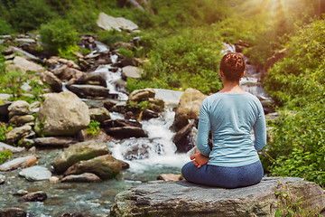 Image showing Yoga outdoors - Padmasana asana lotus pose