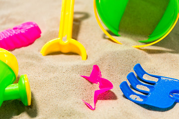 Image showing close up of sand toys kit on summer beach