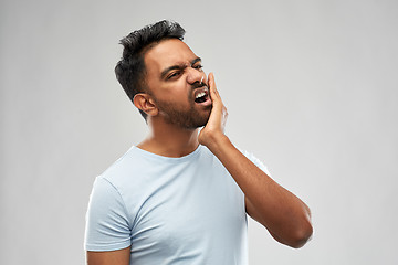 Image showing indian man suffering from toothache