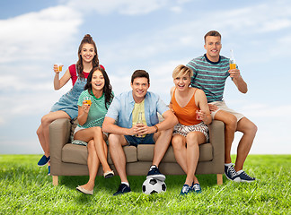 Image showing friends or soccer fans with ball and drinks