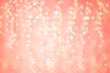 Image showing blurred bokeh lights in living coral color