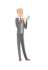 Image showing Senior caucasian businessman holding mobile phone.