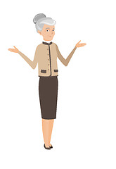 Image showing Caucasian confused business woman with spread arms