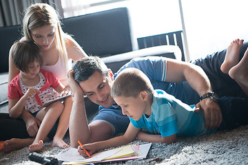 Image showing young couple spending time with kids