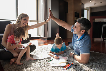 Image showing young couple spending time with kids