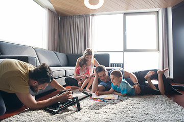 Image showing young couple spending time with kids