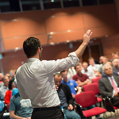 Image showing Public speaker giving talk at Business Event.