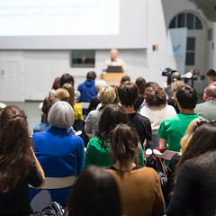 Image showing Man giving presentation in lecture hall at university.