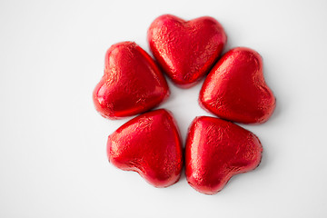 Image showing close up of red heart shaped chocolate candies