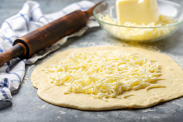 Image showing Preparation of traditional pie with cheese.