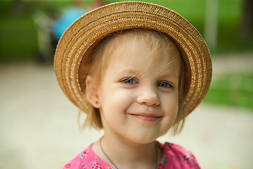 Image showing Cute kid girl wearing hat outdoors