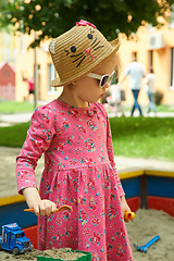 Image showing The child on playground in summer park