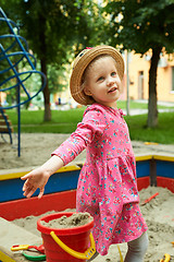 Image showing Child on playground in summer park