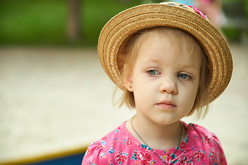 Image showing Cute kid girl wearing hat outdoors