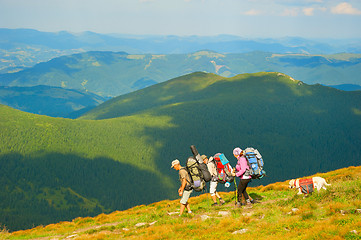 Image showing Group of hikers at mountains