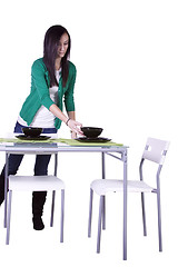 Image showing Beautiful Teenager Preparing the Table
