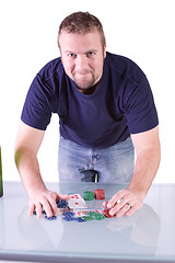 Image showing Man with a Royal Flush Taking his Winings