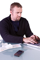 Image showing Young Casual Businessman Working at his Desk