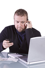 Image showing Young Casual Businessman Working at his Desk