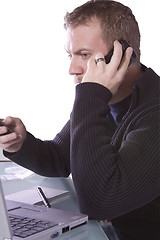 Image showing Young Casual Businessman Working at his Desk