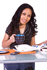 Image showing Beautiful Woman Reading a Magazine