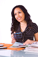 Image showing Beautiful Woman Reading a Magazine