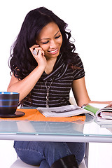 Image showing Beautiful Woman Reading a Magazine