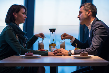 Image showing loving couple enjoying romantic dinner